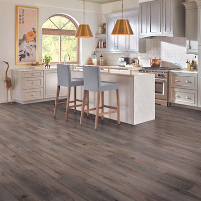luxury vinyl plank flooring in a charming Sand City kitchen with grey cabinets